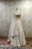 Pristine White Lehenga with Luxurious Golden Embroidery - Bridal & Festive Designer Ensemble