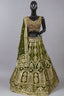 Elegant olive green lehenga set adorned with intricate golden embroidery