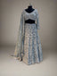Grace meets glamour in this pastel grey net lehenga