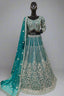 Teal blue lehenga with silver floral embroidery and matching dupatta