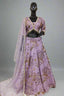 Lavender lehenga adorned with gold floral embroidery