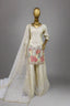 Graceful off-white sharara suit embellished with floral embroidery