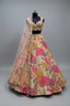 Soft peach pink lehenga with vibrant floral embroidery