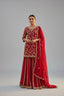 Rich red ethnic ensemble with intricate golden embroidery