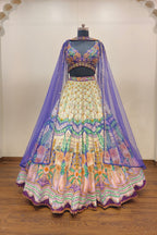 Luxurious Multi-Toned Lehenga with Cream Base and Elegant Purple Net Dupatta - Designer Ethnic Masterpiece