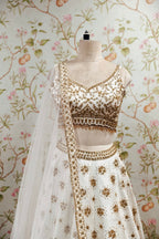 Pristine White Lehenga with Luxurious Golden Embroidery - Bridal & Festive Designer Ensemble