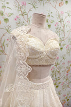White Resham work lehenga with zari
