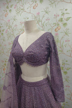 purple color Zari work lehenga choli