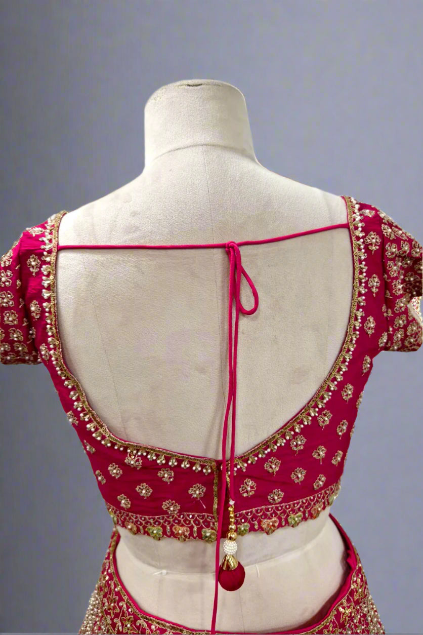 Regal Rani Pink Hand-Embroidered  Lehenga with Intricate Zari Work