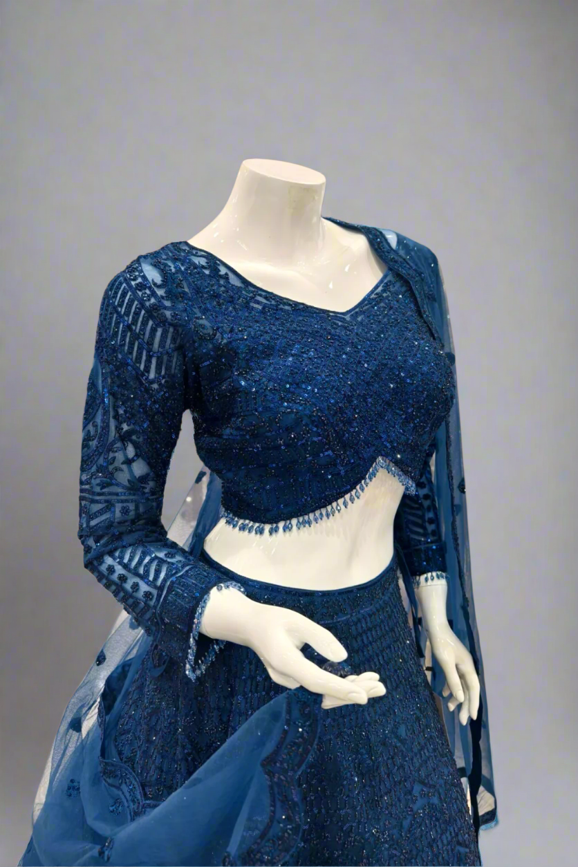 Enchanting Midnight Blue Net Lehenga with Intricate Handwork.