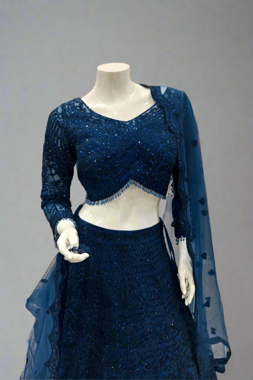 Enchanting Midnight Blue Net Lehenga with Intricate Handwork.