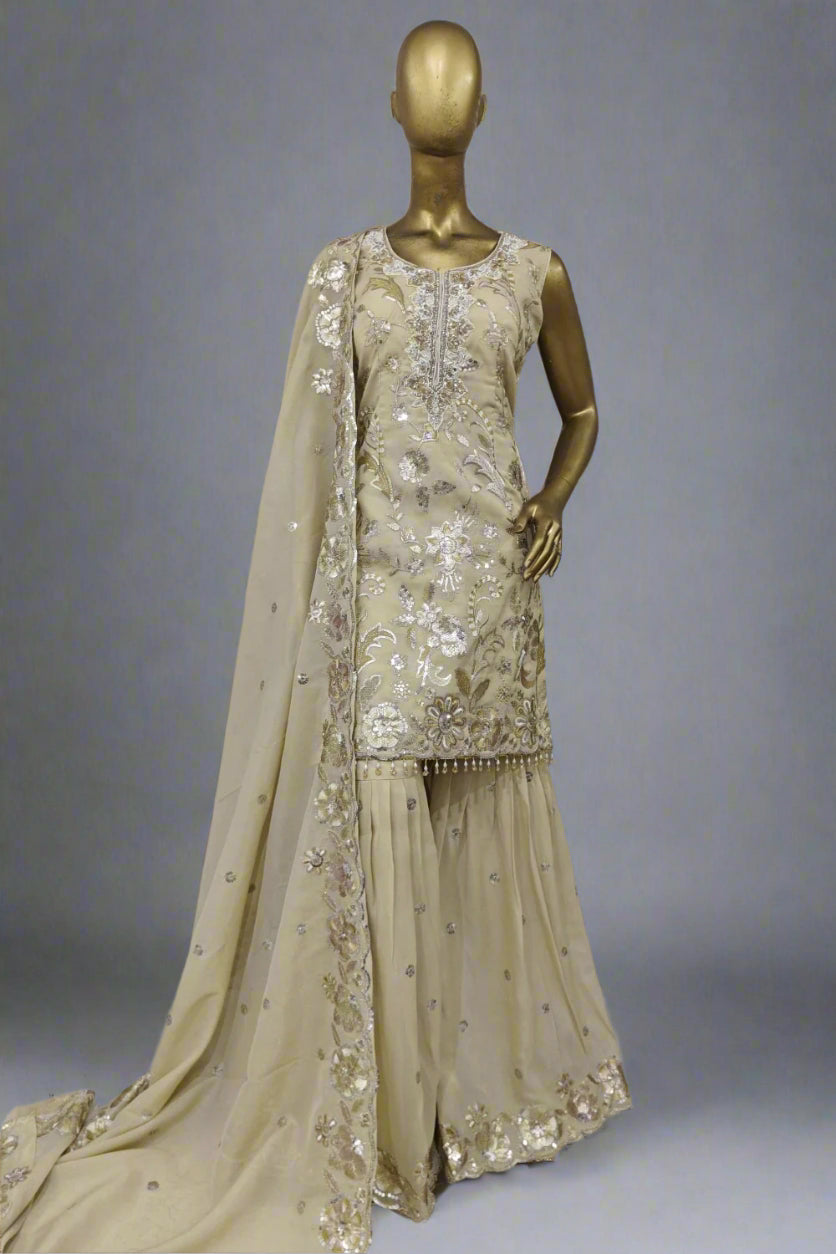 Brocade base sharara suit with soft net dupatta
