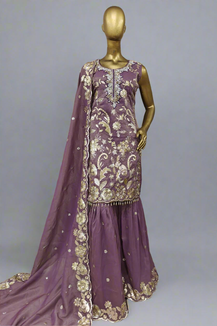 Brocade base sharara suit with soft net dupatta