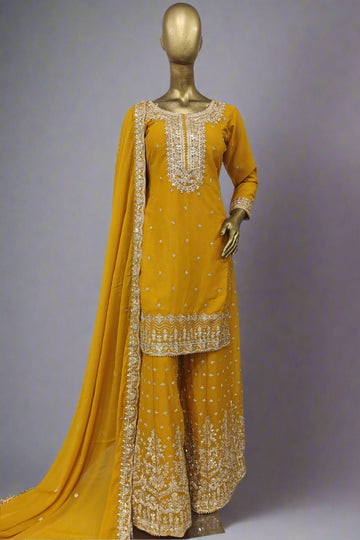 Bright mustard sharara suit with delicate silver embroidery