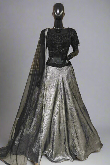 Glamorous black and silver lehenga with a shimmering skirt and sequined blouse