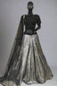 Glamorous black and silver lehenga with a shimmering skirt and sequined blouse