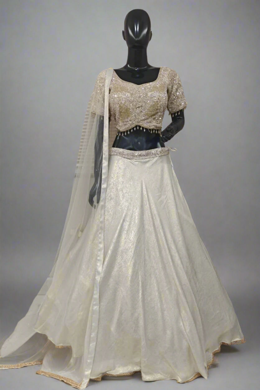 Glamorous black and silver lehenga with a shimmering skirt and sequined blouse