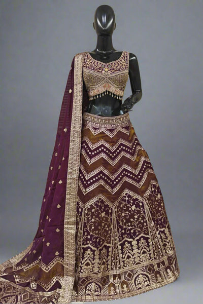 Traditional red lehenga with rich gold embroidery