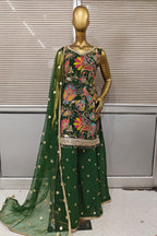 Stunning bright pink Punjabi suit featuring heavy floral embroidery