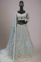 Sparkly blue lehenga with Sequins and moti work