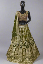 Elegant olive green lehenga set adorned with intricate golden embroidery