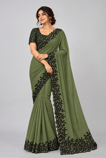 Elegant olive green saree featuring intricate black floral embroidery