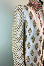 White Sherwani with Pink and Green Embroidery