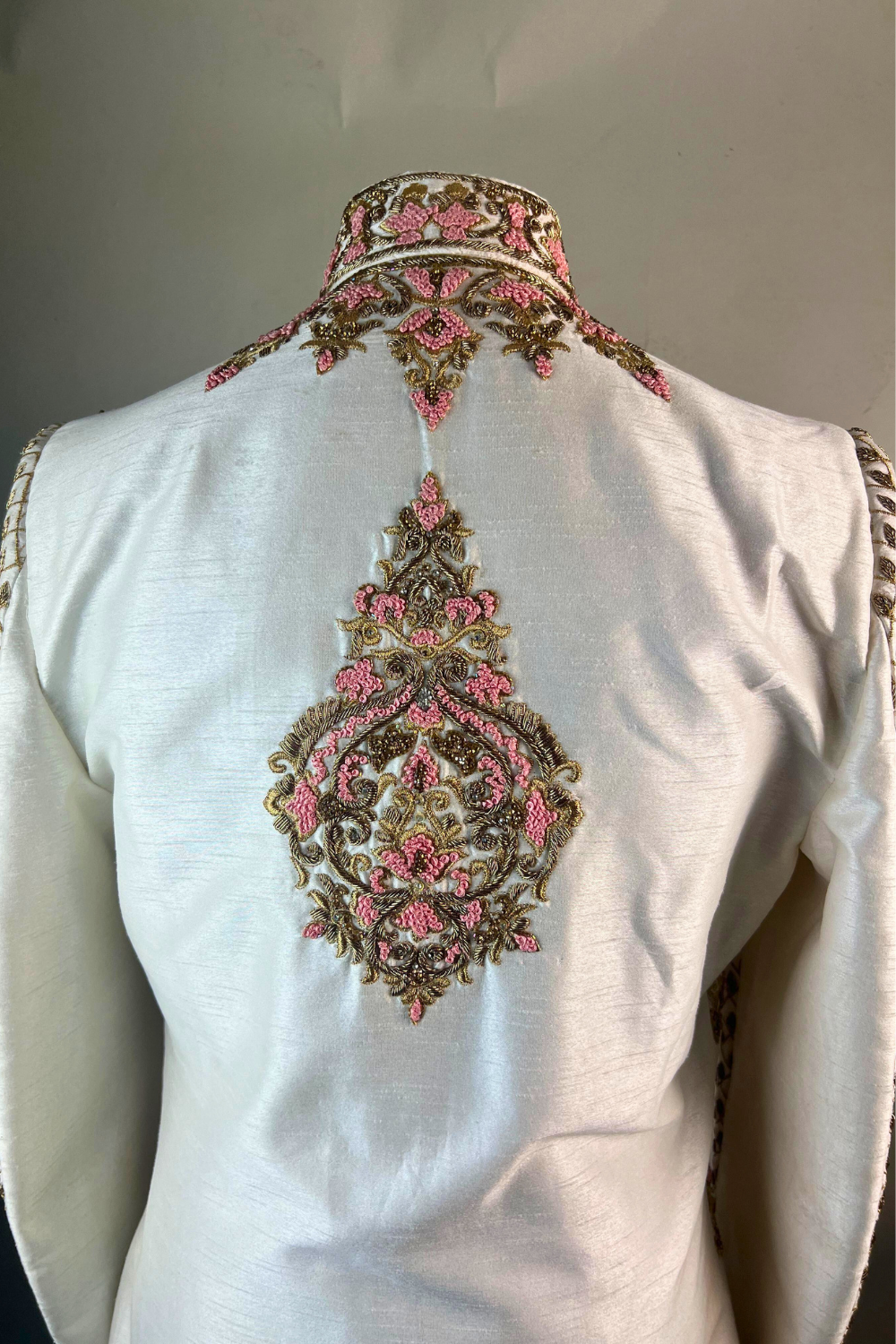 White Sherwani with Pink and Green Embroidery