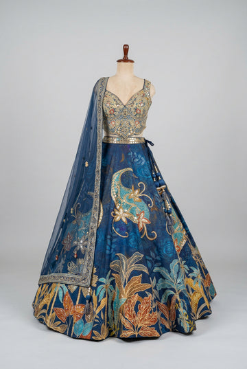 Royal navy blue lehenga featuring intricate gold embroidery