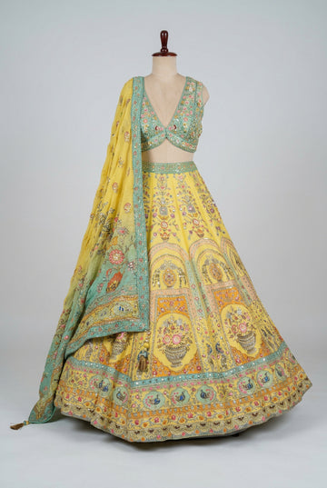 Beautiful sunshine-yellow lehenga featuring intricate floral embroidery,