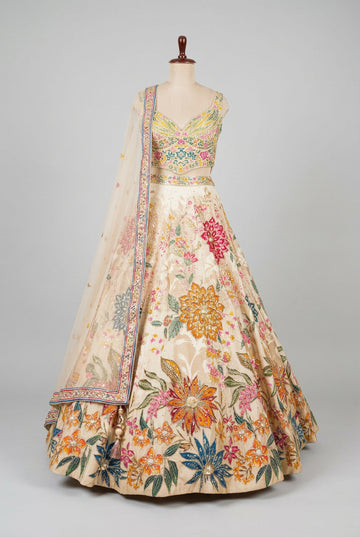 Elegant ivory floral lehenga adorned with vibrant embroidery