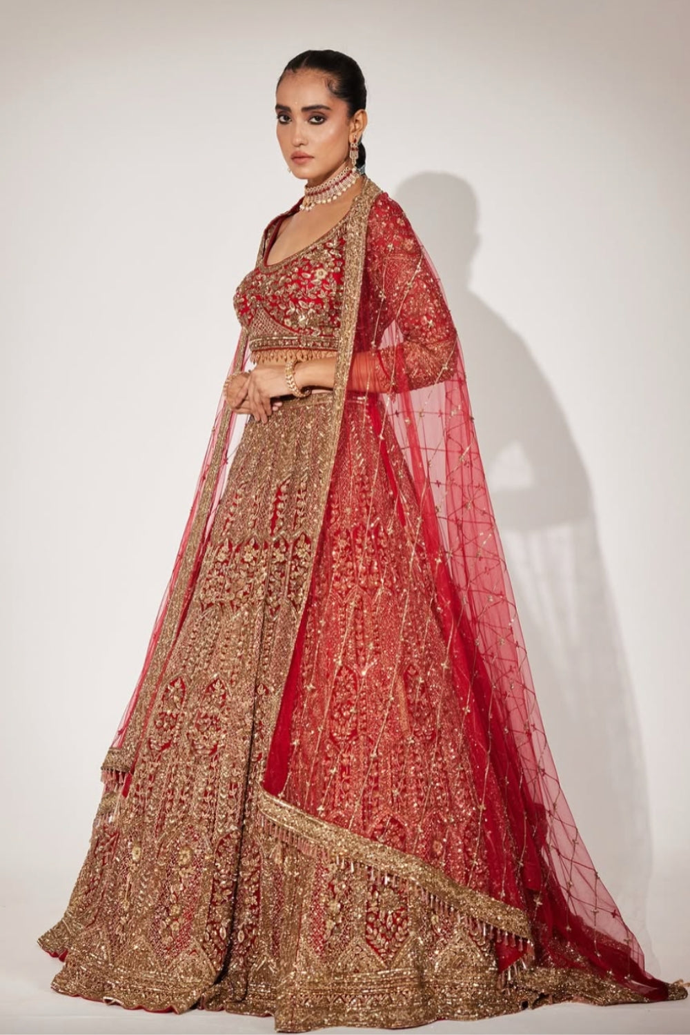 Gold on Red Bridal Lehenga with Heavy Embroidery