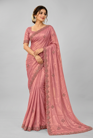 Elegant rose-pink saree featuring delicate floral embellishments