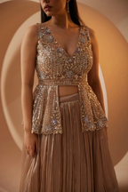 Peplum blouse lehenga with gold zari work