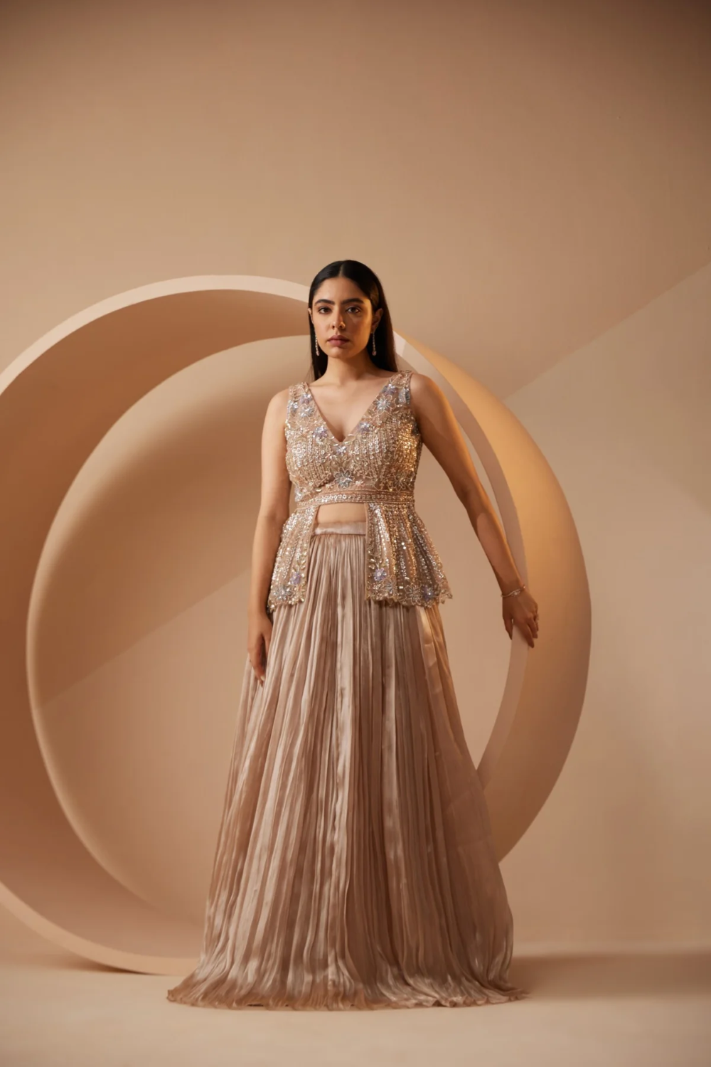 Peplum blouse lehenga with gold zari work