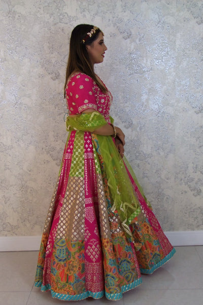 Multicolor banarasi lehenga with heavy hand embroidered top