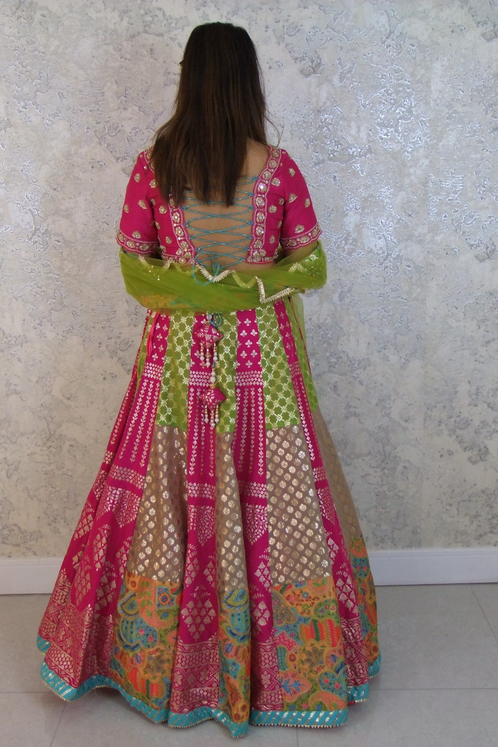 Multicolor banarasi lehenga with heavy hand embroidered top