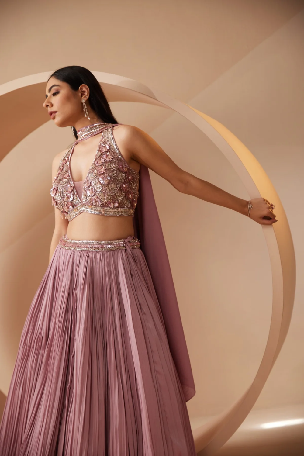 Nude color lehenga embroidered with sequins and cutdana