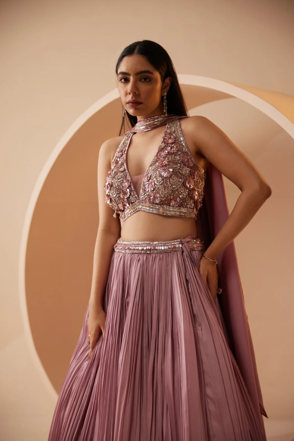 Nude color lehenga embroidered with sequins and cutdana