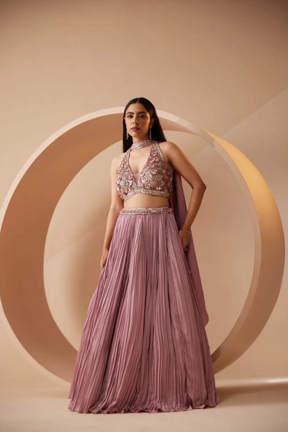 Nude color lehenga embroidered with sequins and cutdana