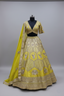 Lime yellow lehenga with heavy mirror embroidery