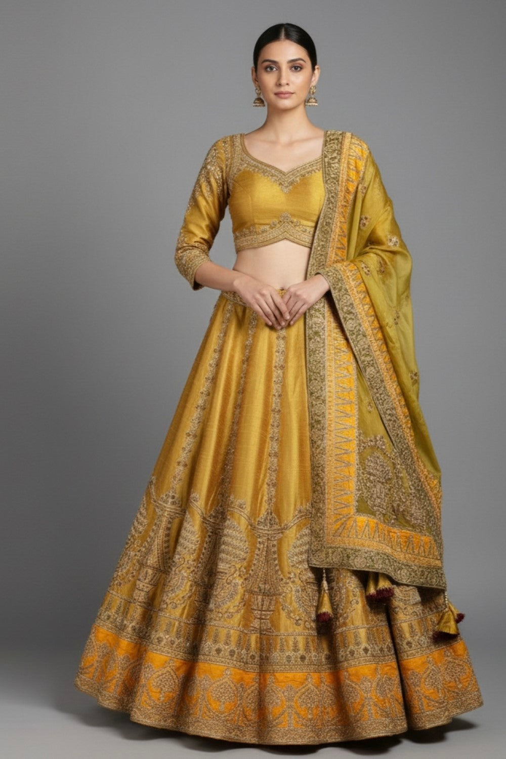 Elegant mustard gold lehenga set with intricate embroidery, perfect for wedding.