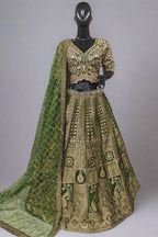 Stunning green lehenga set featuring rich golden embroidery.