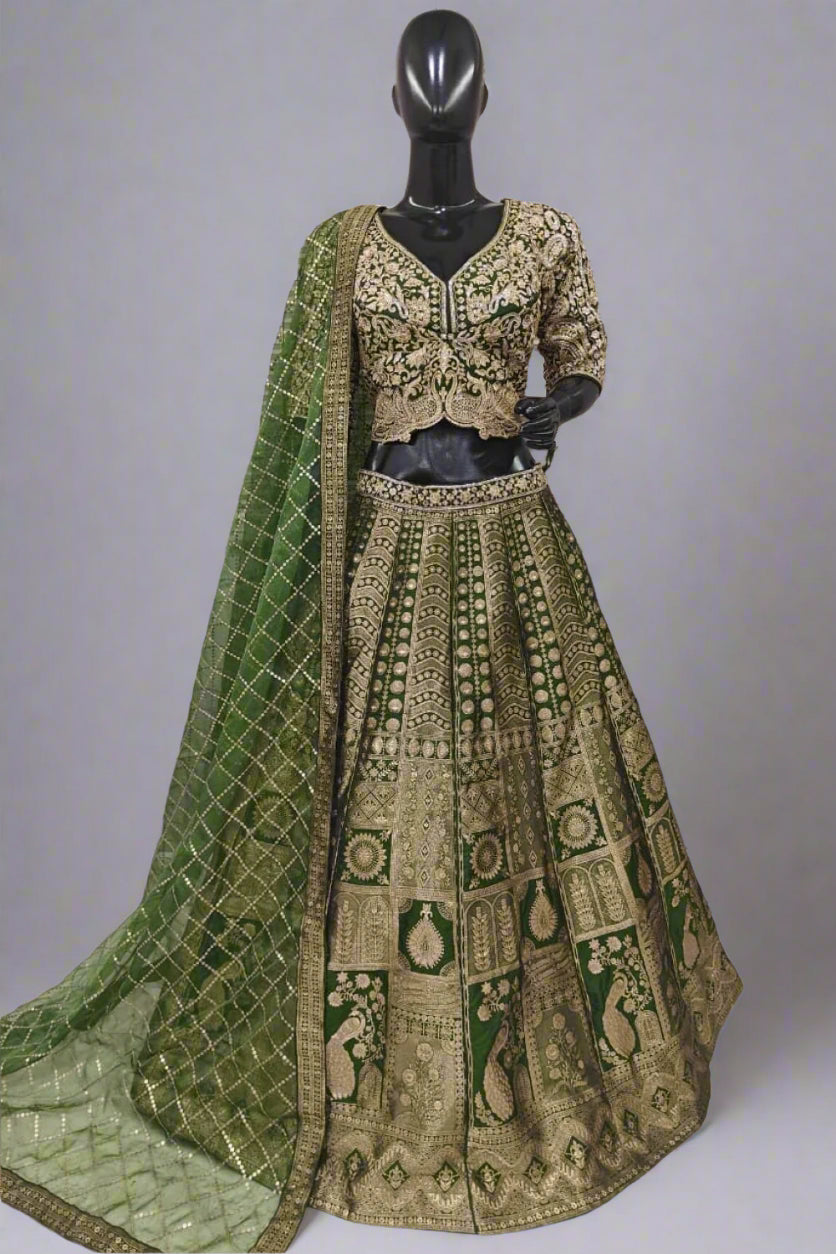 Stunning green lehenga set featuring rich golden embroidery.