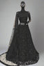Stunning black designer lehenga with intricate sequin embroidery.