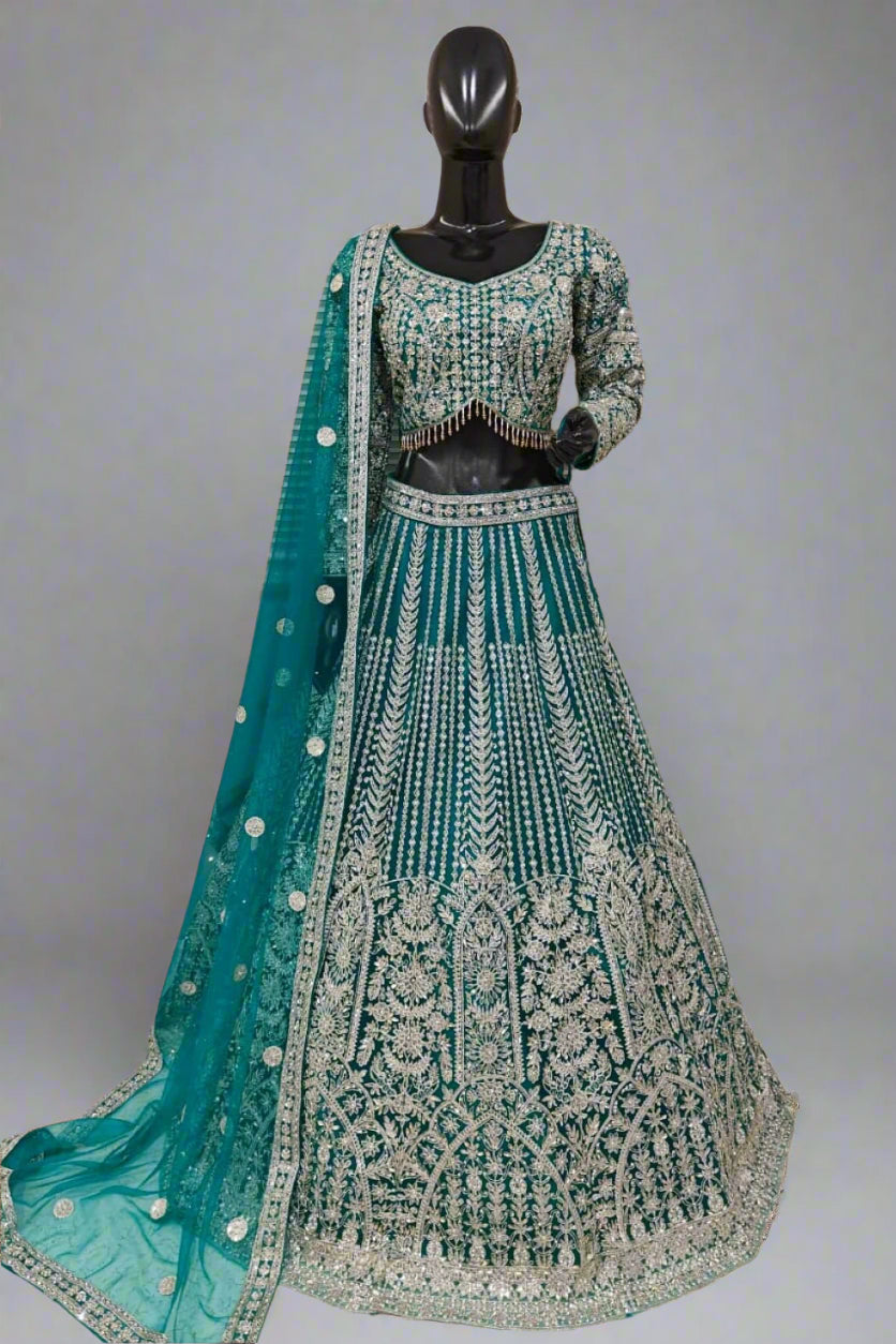 Teal blue lehenga with silver floral embroidery and matching dupatta