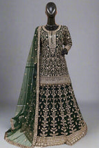 Light blue heavily embroidered ethnic outfit with exquisite golden work