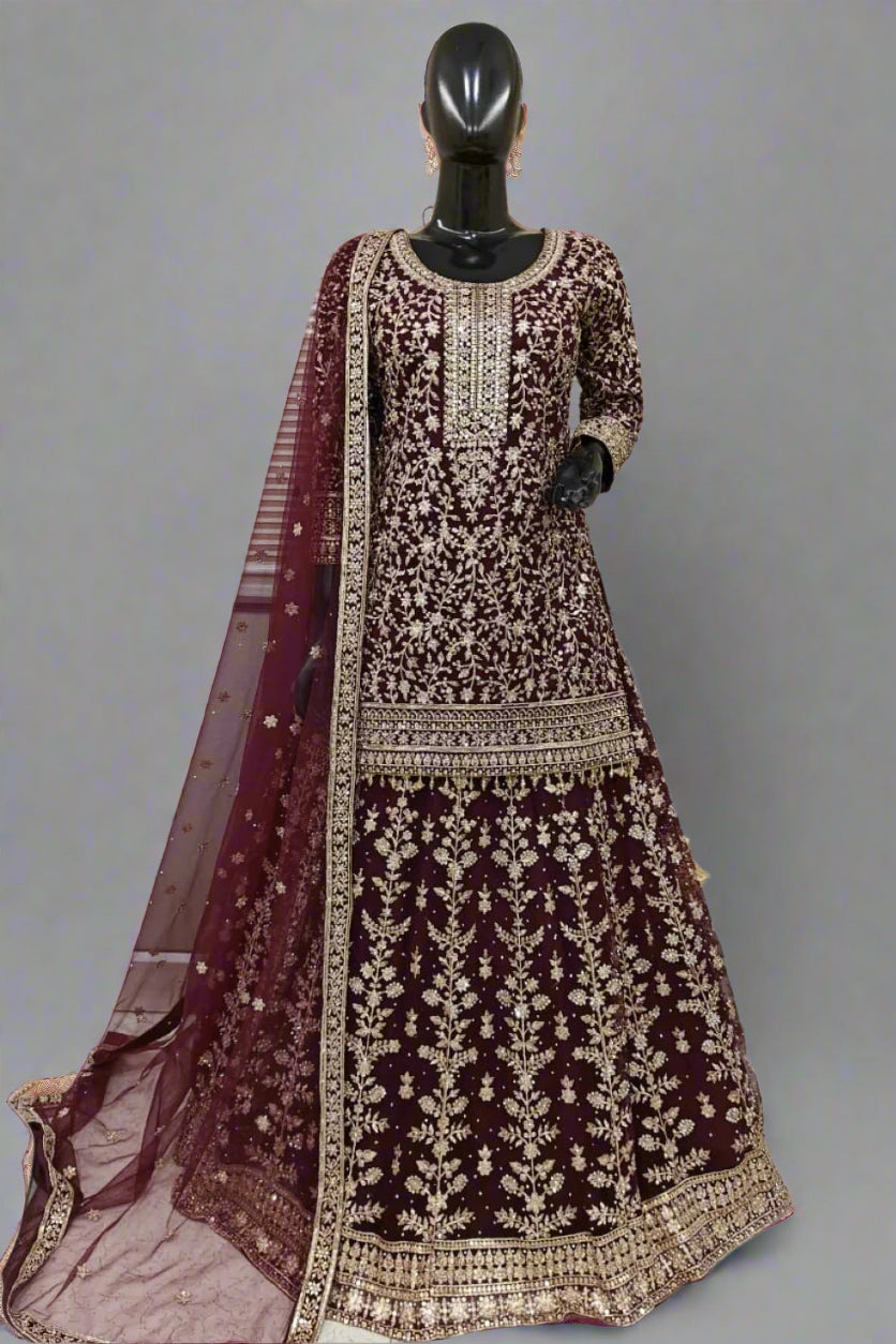 Light blue heavily embroidered ethnic outfit with exquisite golden work