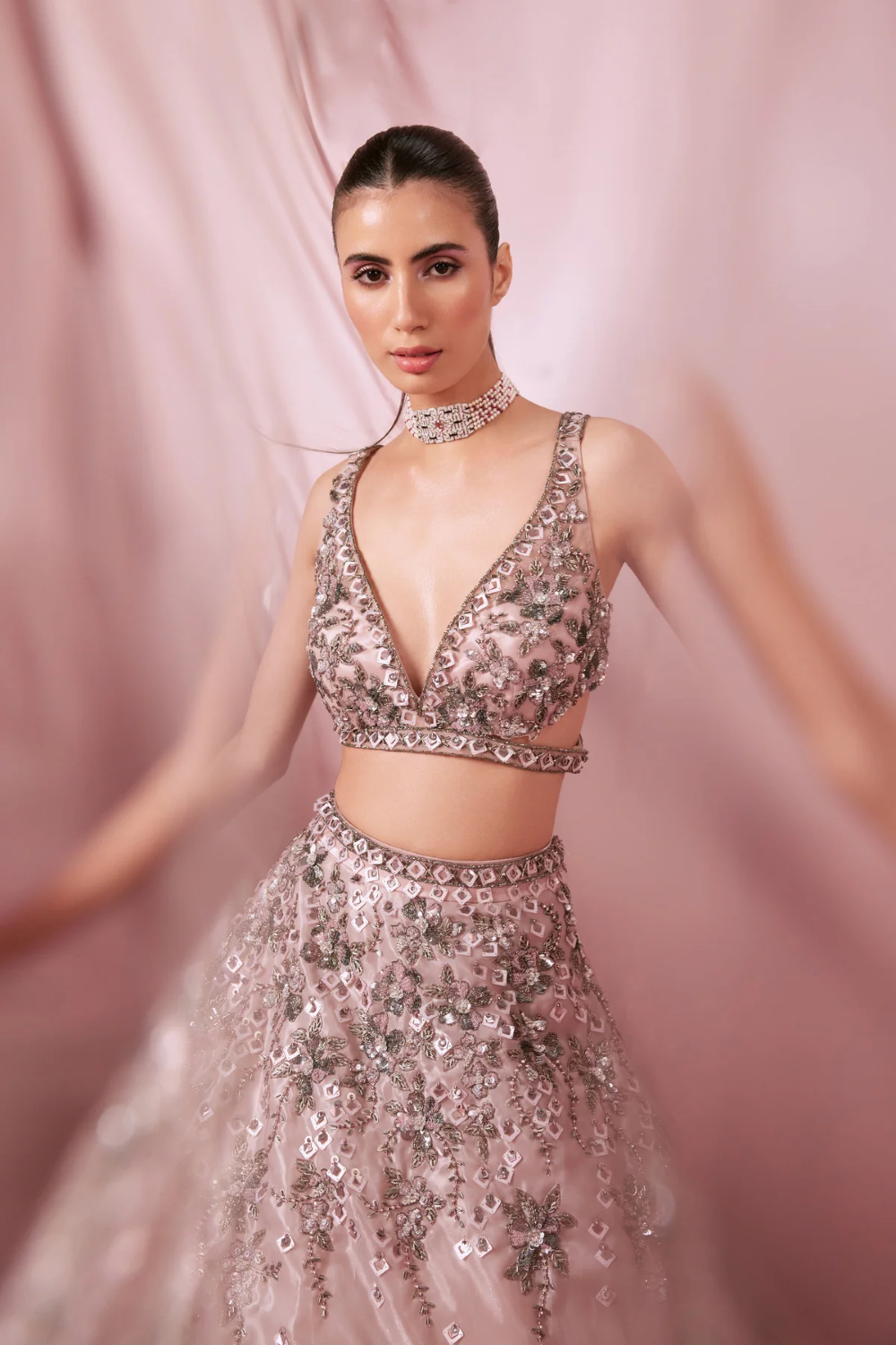 Pink Organza lehenga embellished with  zari and resham