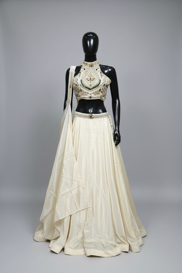Biege Silk Lehenga with Embellished Halter Neck Blouse